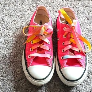 Bright pink converse shoes.  EUC